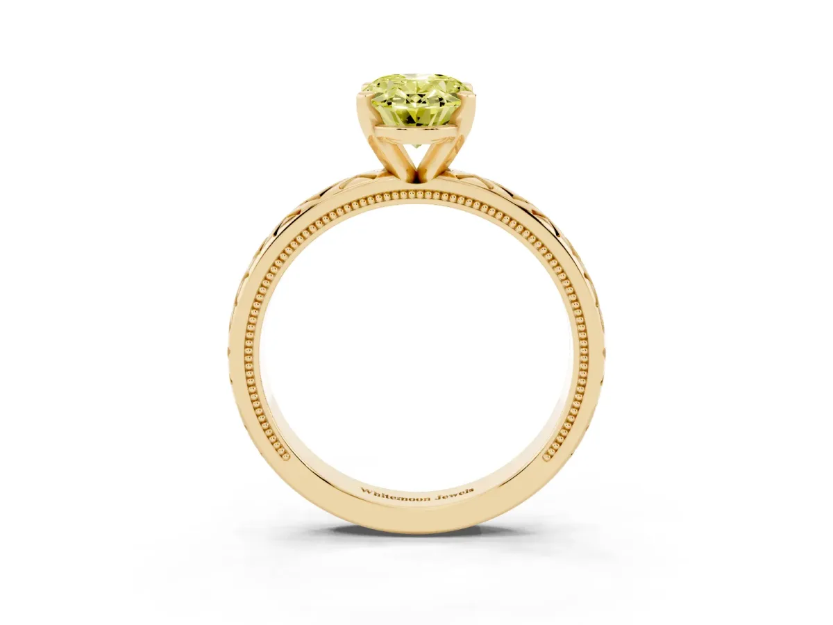 Fancy Yellow Oval Cut Solitaire Diamond Ring with Milgrain and Black Enamel X Pattern Band Yellow gold