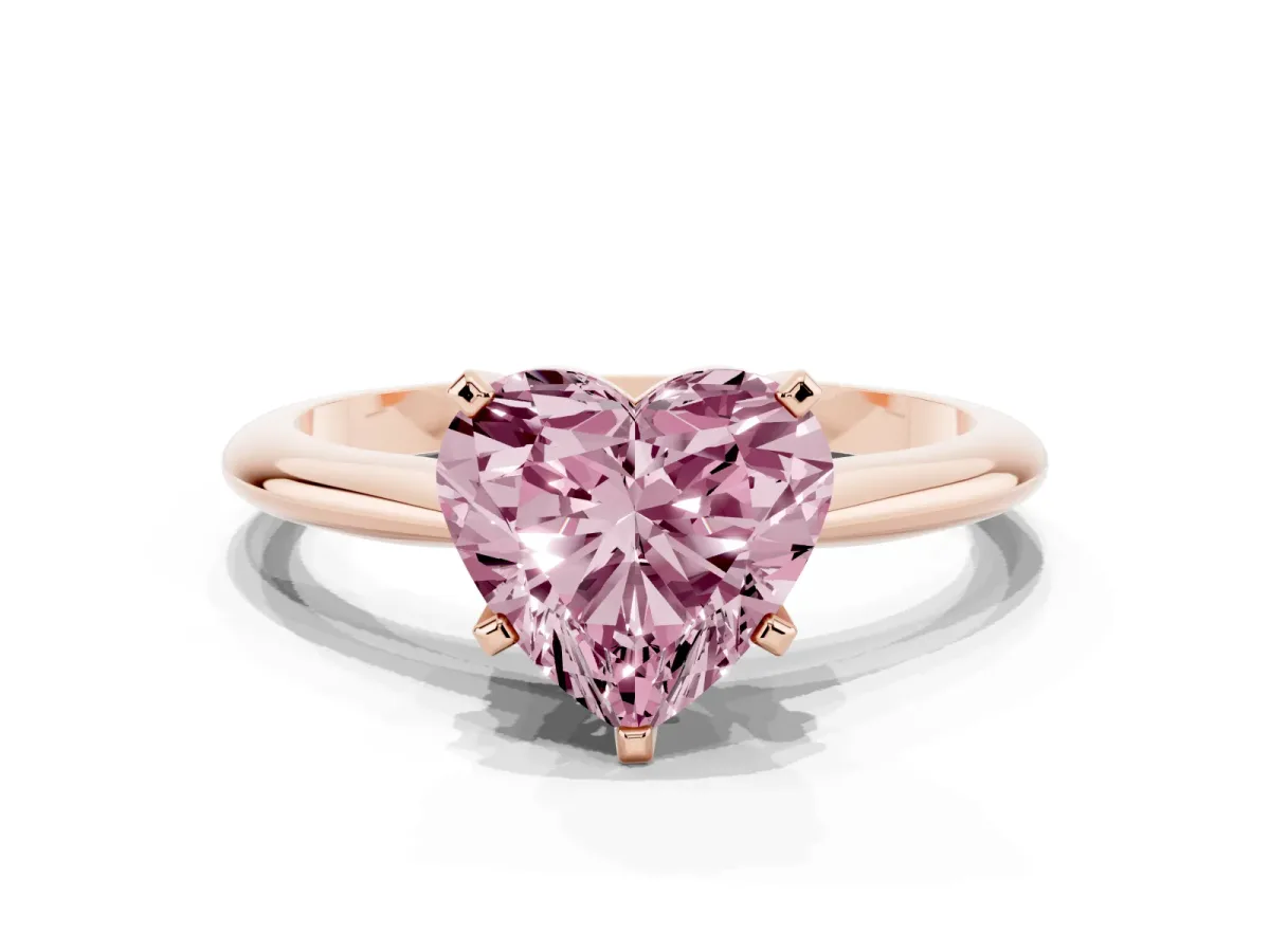 Fancy Pink Heart Cut Cut Solitaire Ring with Four-Prong Setting on a Classic Band Rose gold
