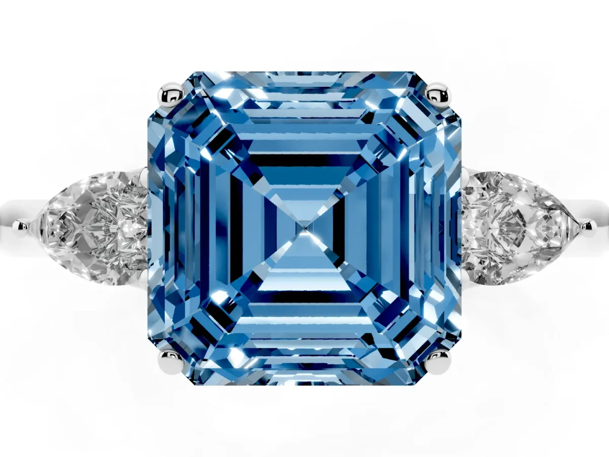Fancy Blue Three-Stone Asscher Cut Diamond Ring with Pear Side Stones in Four-Prong Setting Silver