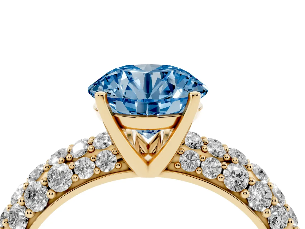 Fancy Blue Round Cut Diamond Pavé Band Solitaire Ring with Four-Prong Setting Yellow gold