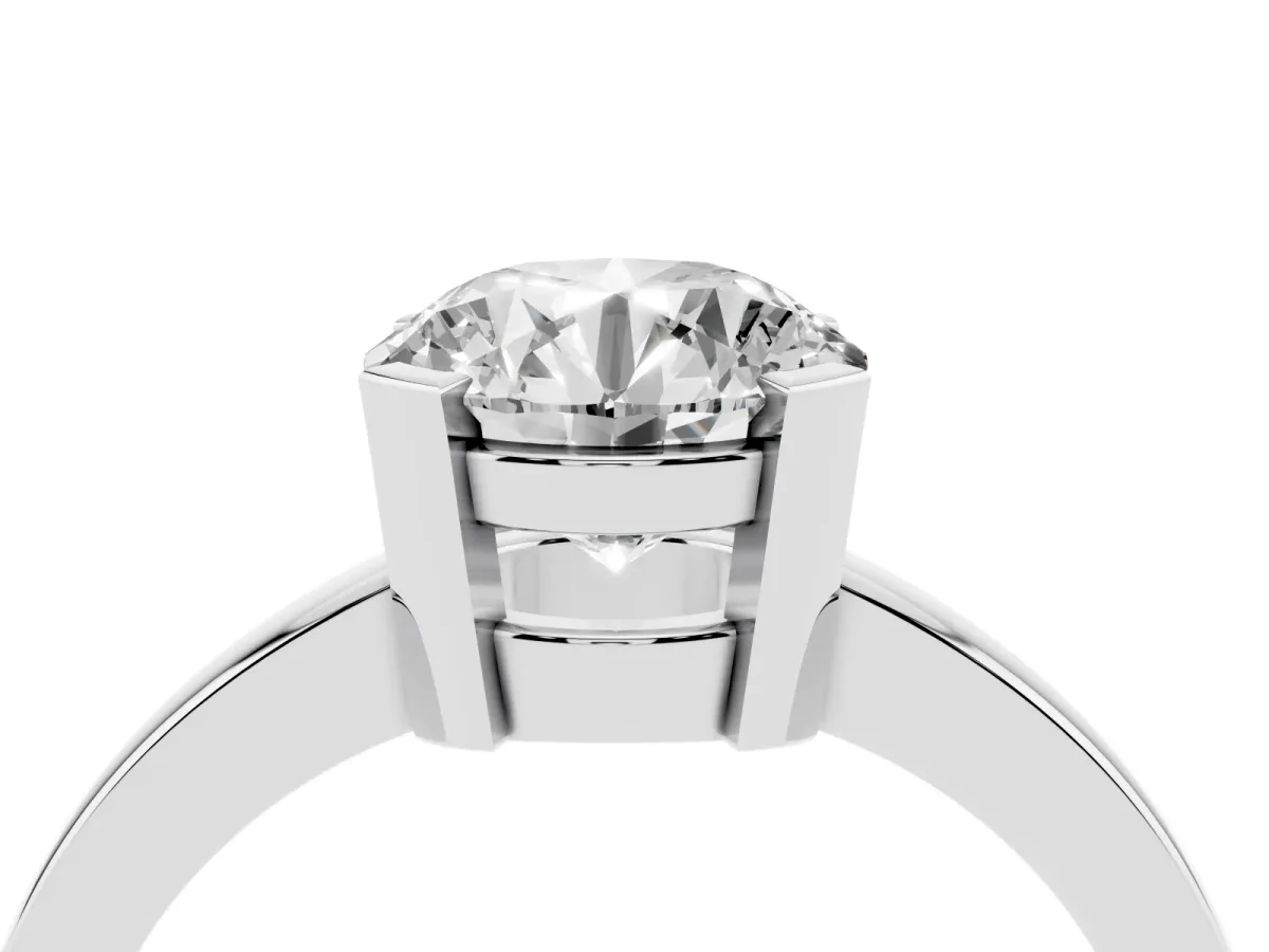 Round Cut Cut Solitaire Ring with Four-Prong Setting and Classic Band Silver