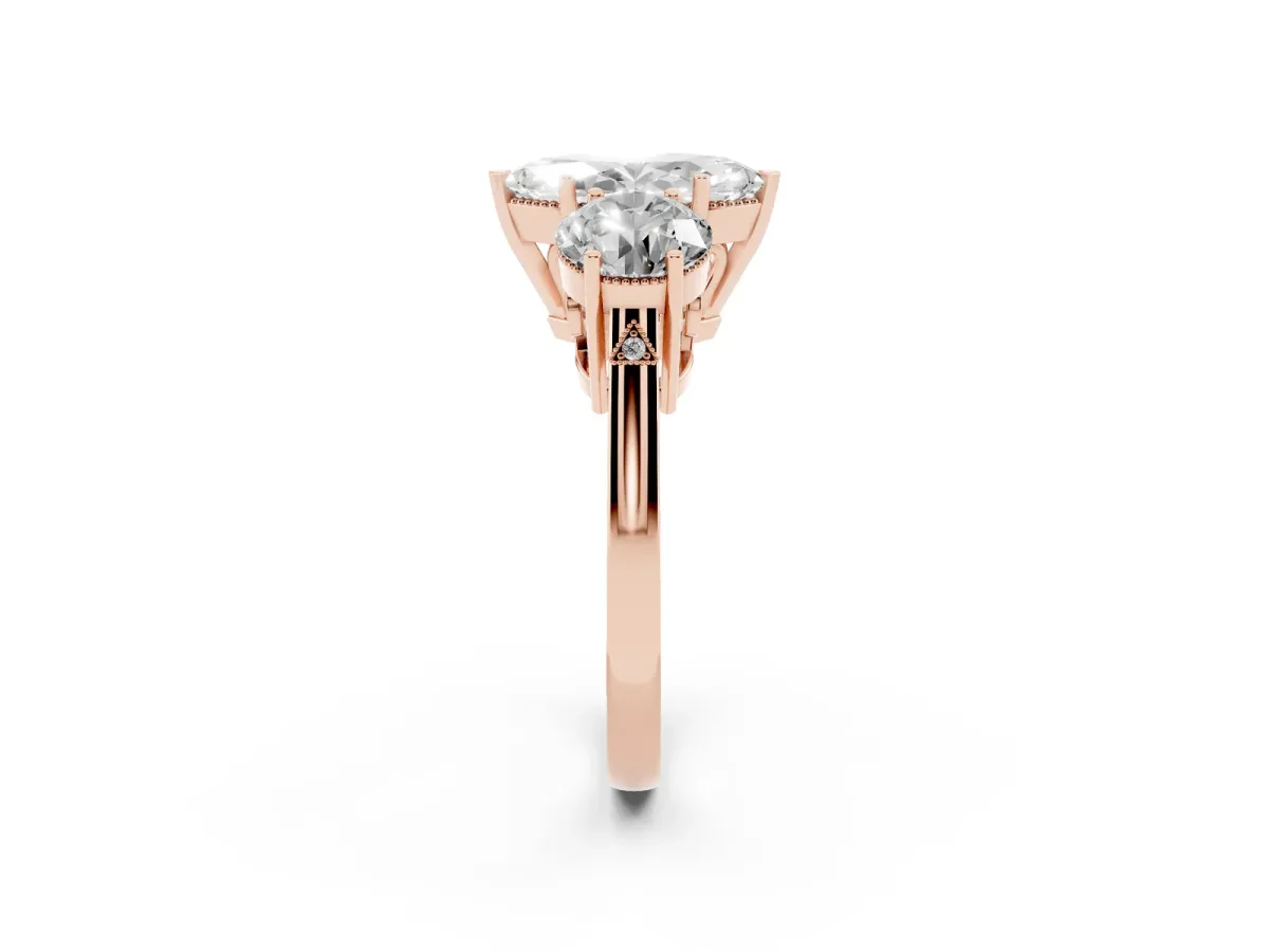 Three-Stone Marquise Cut Diamond Engagement Ring with Prong Setting on a Classic Band Rose gold
