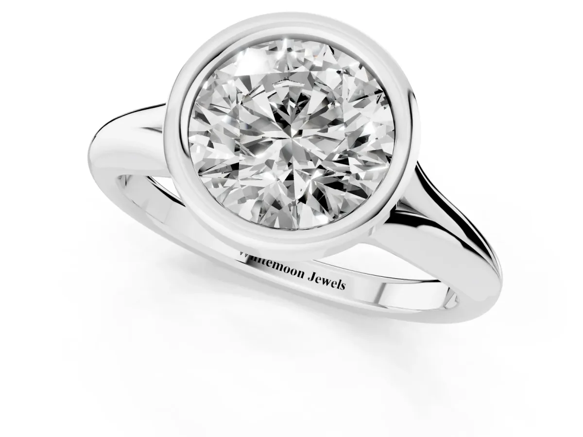 Bezel Set Round Cut Solitaire Diamond Ring with Smooth Band Platinum