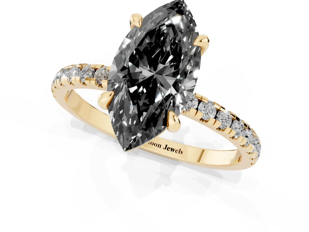 Fancy Black Marquise Cut Diamond Brilliant Solitaire Ring with Pavé Band and Four-Prong Setting Yellow gold