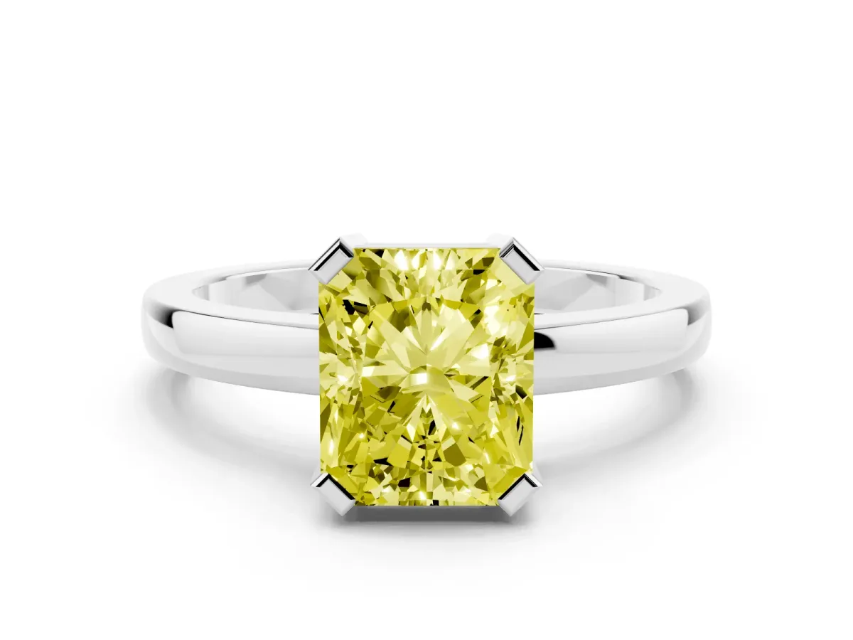 Fancy Yellow Radiant Cut Cut Solitaire Ring with Four-Prong Setting and Classic Band Silver