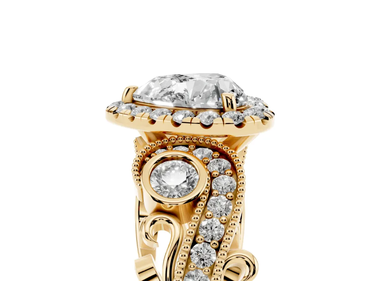 Heart Cut Halo Diamond Ring with Milgrain and Bezel Accents on a Split Shank Band Yellow gold