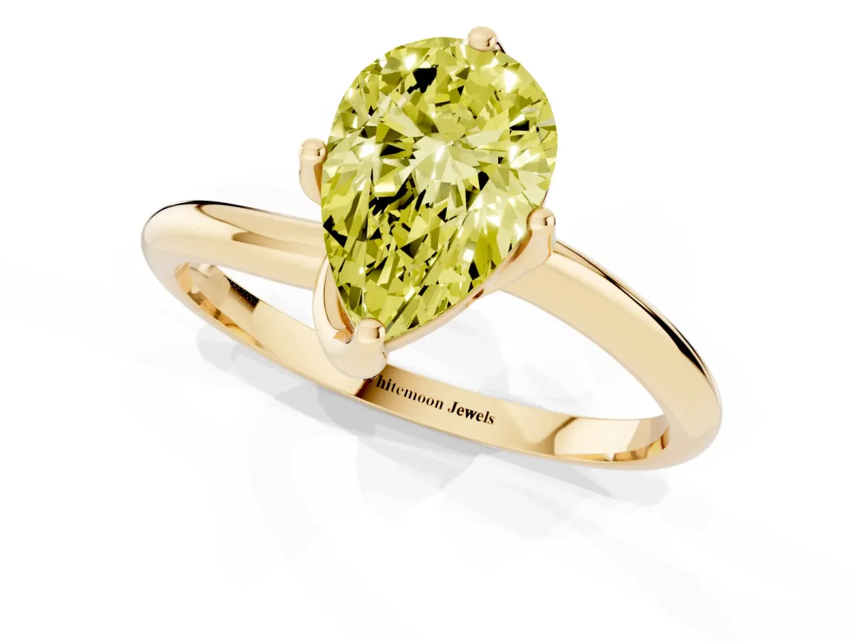 Fancy Yellow Pear Cut Diamond Solitaire Engagement Ring with Four-Prong Setting and Classic Band Yellow gold