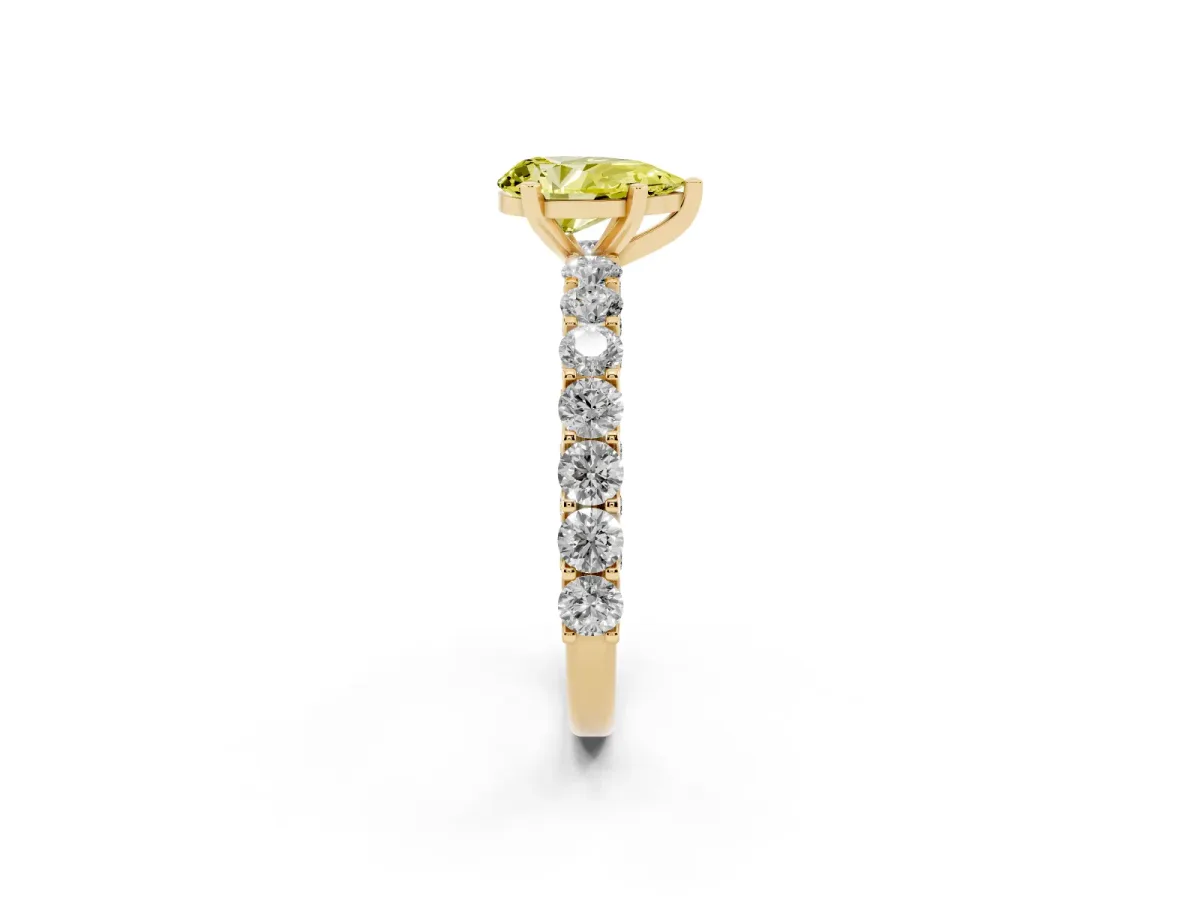 Fancy Yellow Pear Cut Diamond Solitaire Ring with Shared Prong Pavé Band and Four-Prong Setting Yellow gold