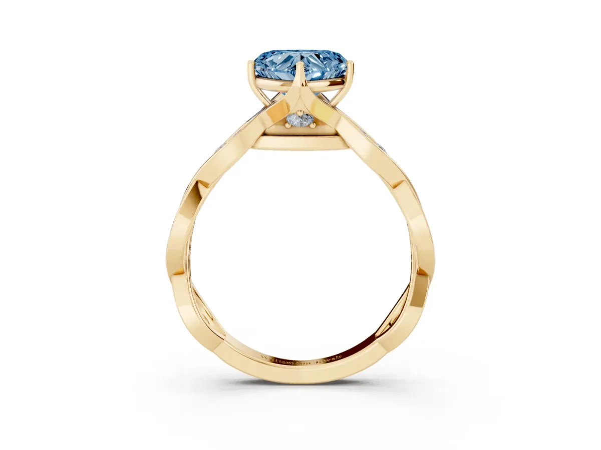 Fancy Blue Heart Cut Solitaire Twist Band with Leaf Prong Setting Yellow gold