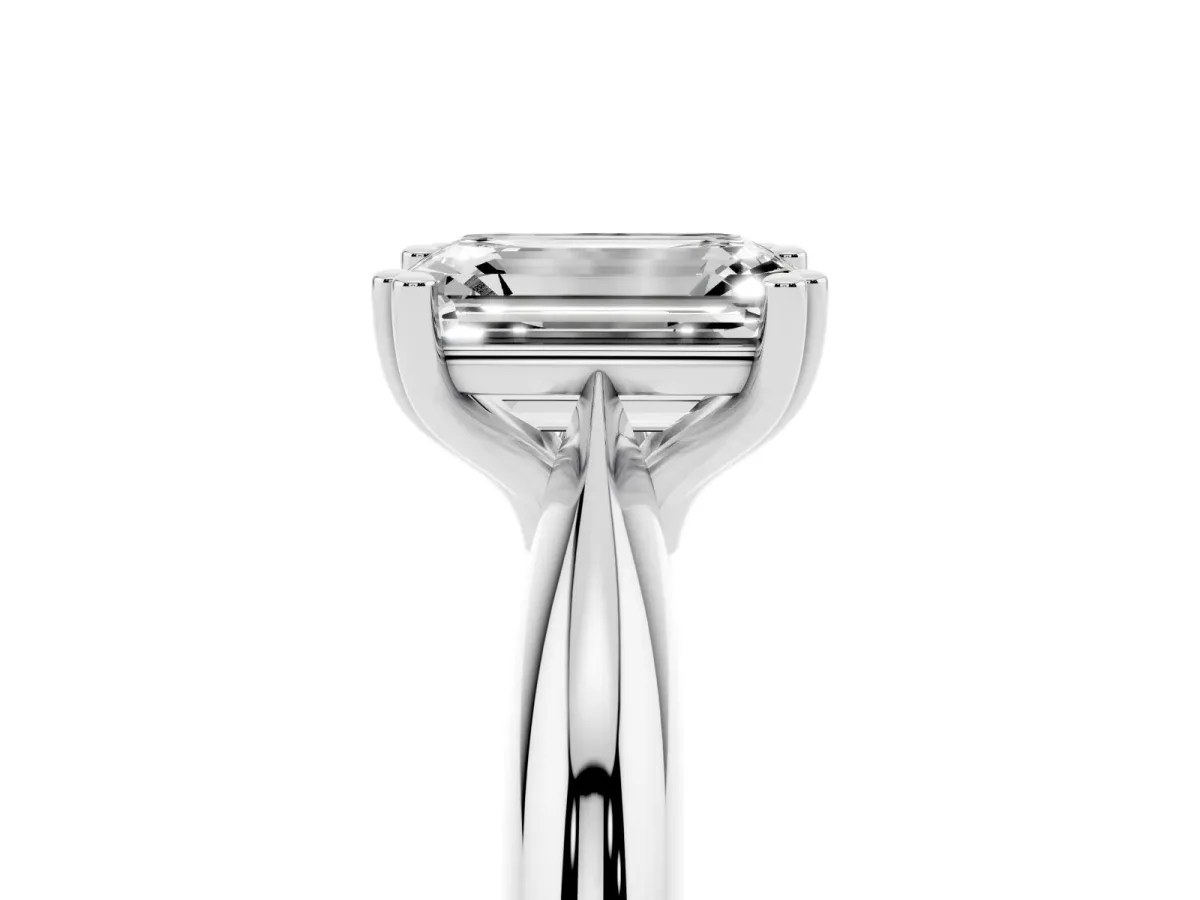 Emerald Cut Cut Solitaire Engagement Ring with Tapered Band and Four-Prong Setting Silver