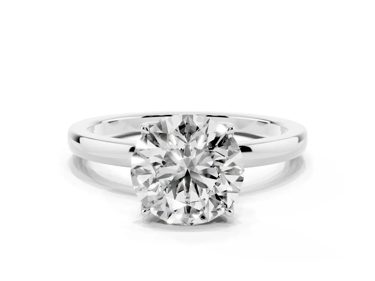 Round Cut Diamond Solitaire Ring with Thin Band and Prong Setting Platinum