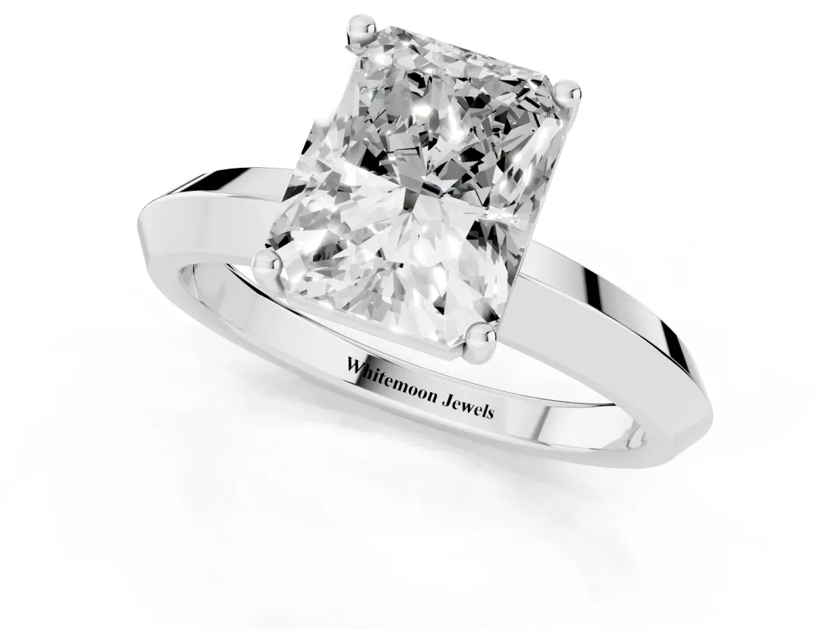 Radiant Cut Cut Solitaire Engagement Ring with Flat Band and Four-Prong Setting Silver