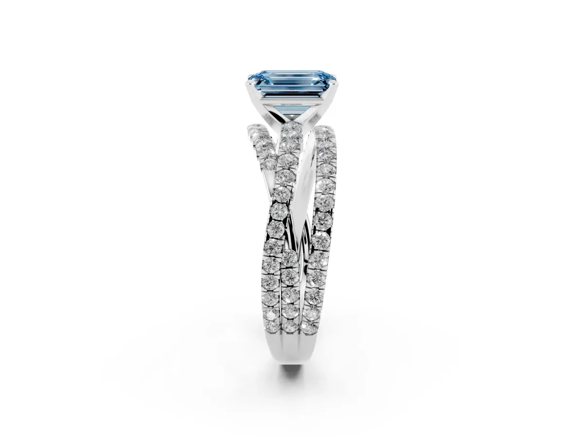 Fancy Blue Emerald Cut Solitaire Twist Band with Pavé Setting and Four-Prong Setting Silver