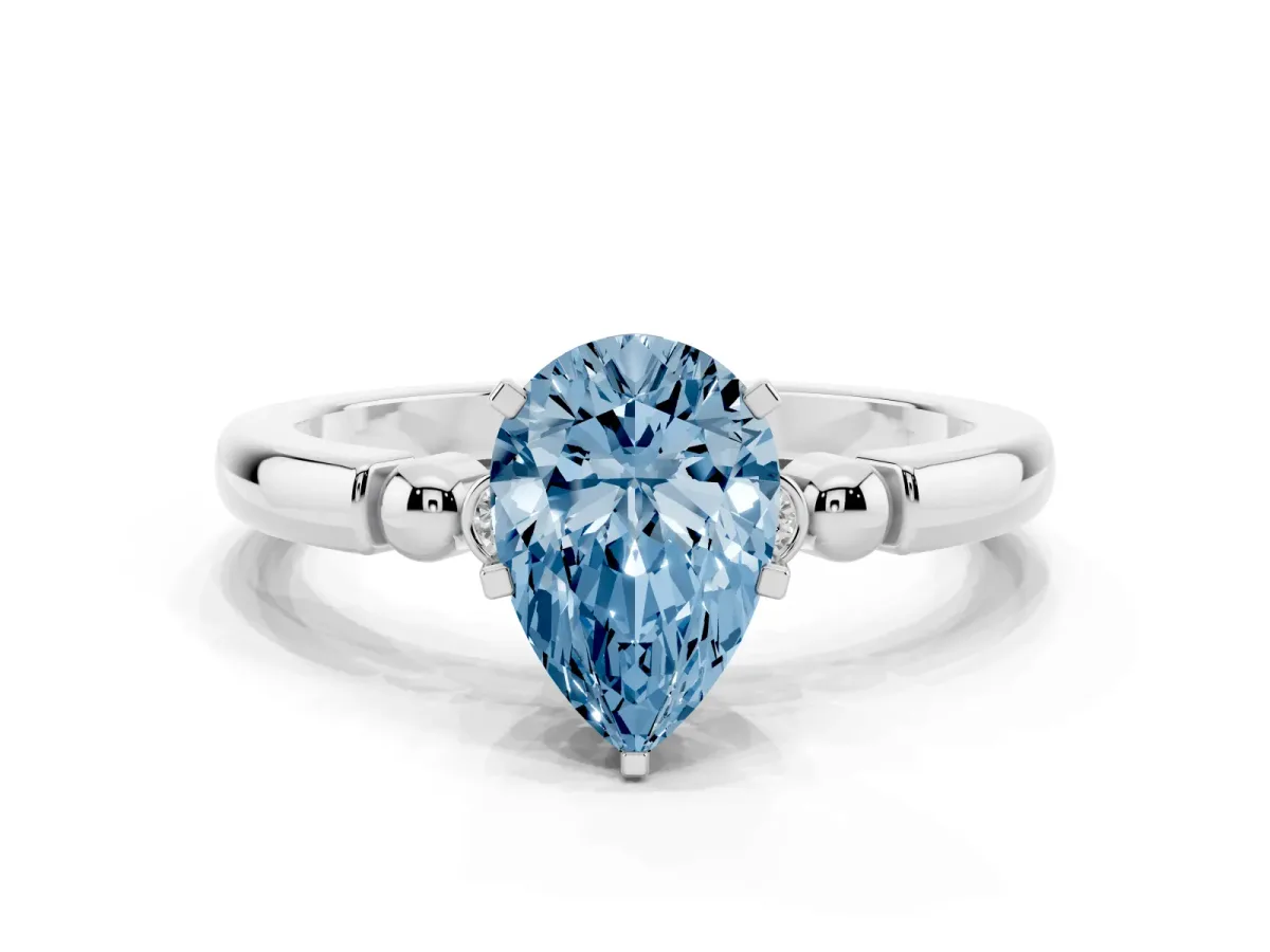 Fancy Blue Pear Cut Solitaire Beaded Band with Four-Prong Setting Silver