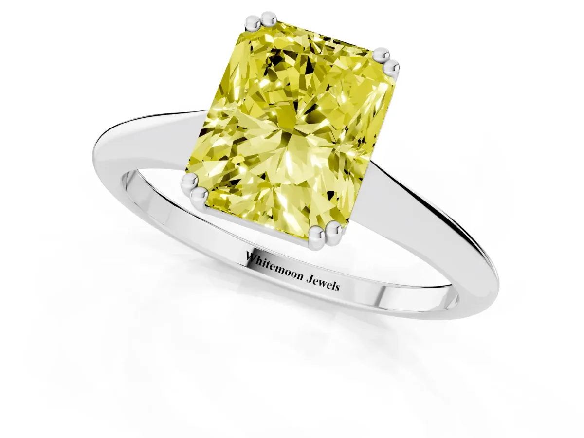 Fancy Yellow Radiant Cut Solitaire Diamond Ring with Six-Prong Setting and Classic Band Silver