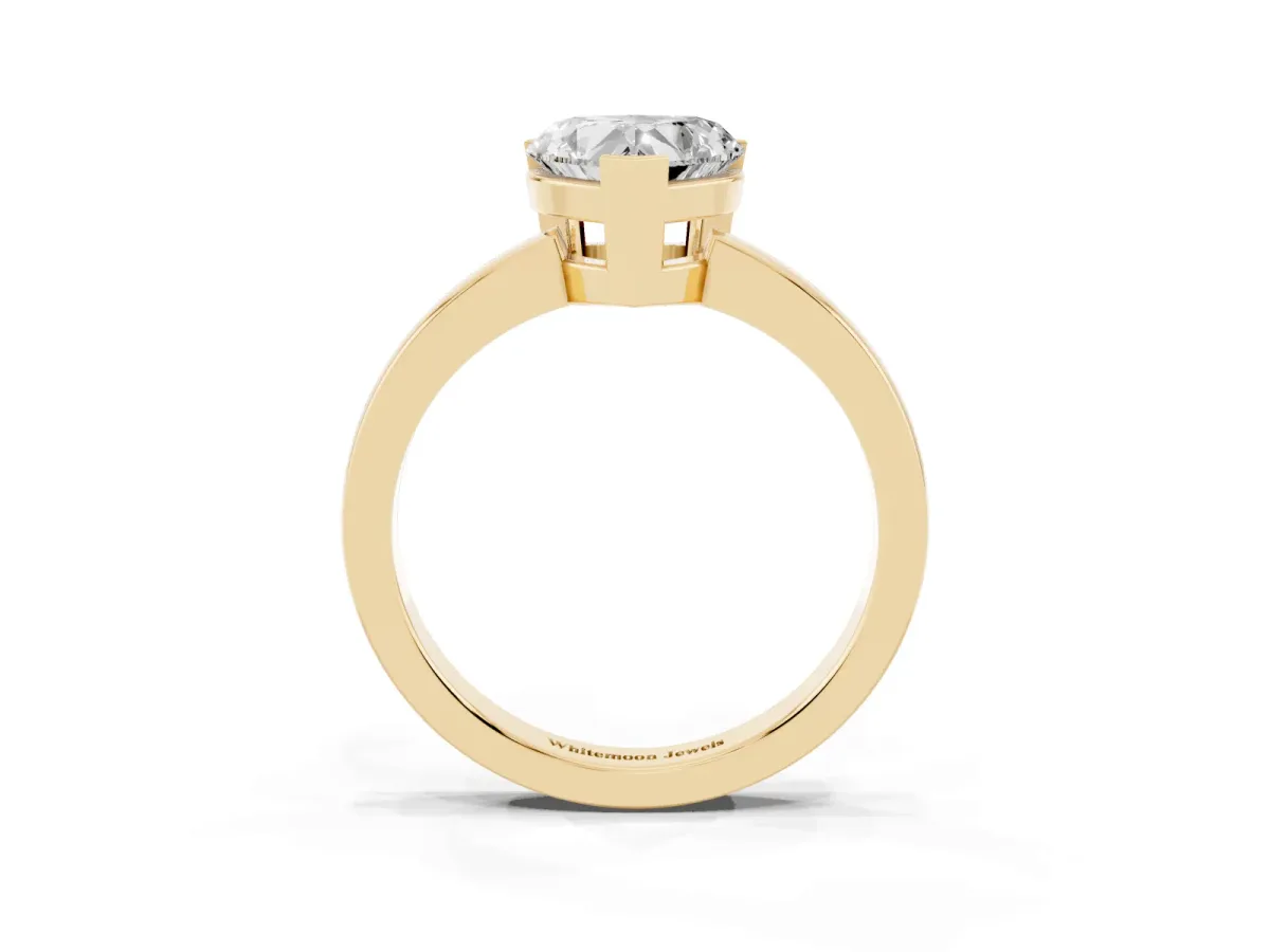 Heart Cut Cut Solitaire Ring with Four-Prong Setting and Classic Band Yellow gold