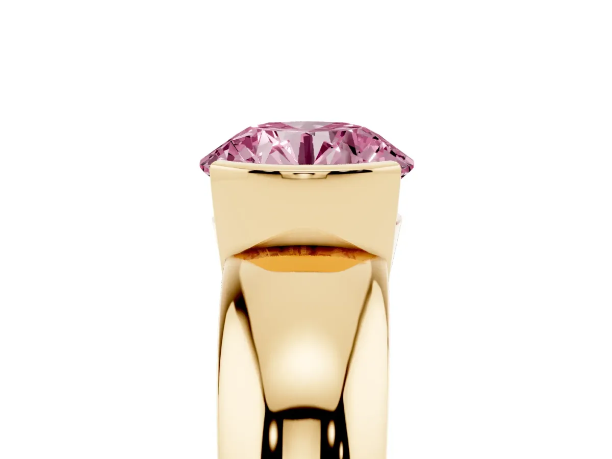 Fancy Pink Round Cut Solitaire Tension Set Diamond Ring with Wide Band Yellow gold