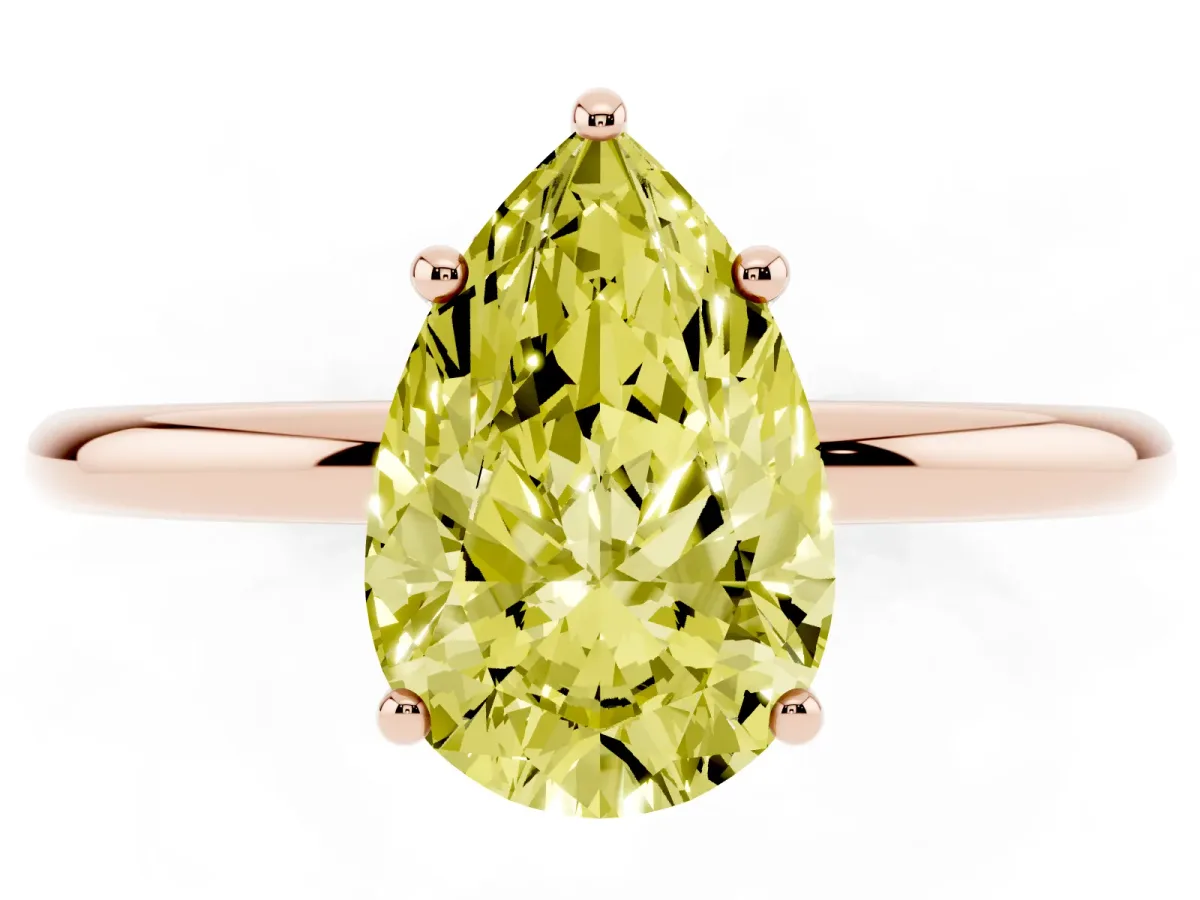 Fancy Yellow Pear Cut Solitaire Diamond Ring with a Classic Band and Four-Prong Setting Rose gold
