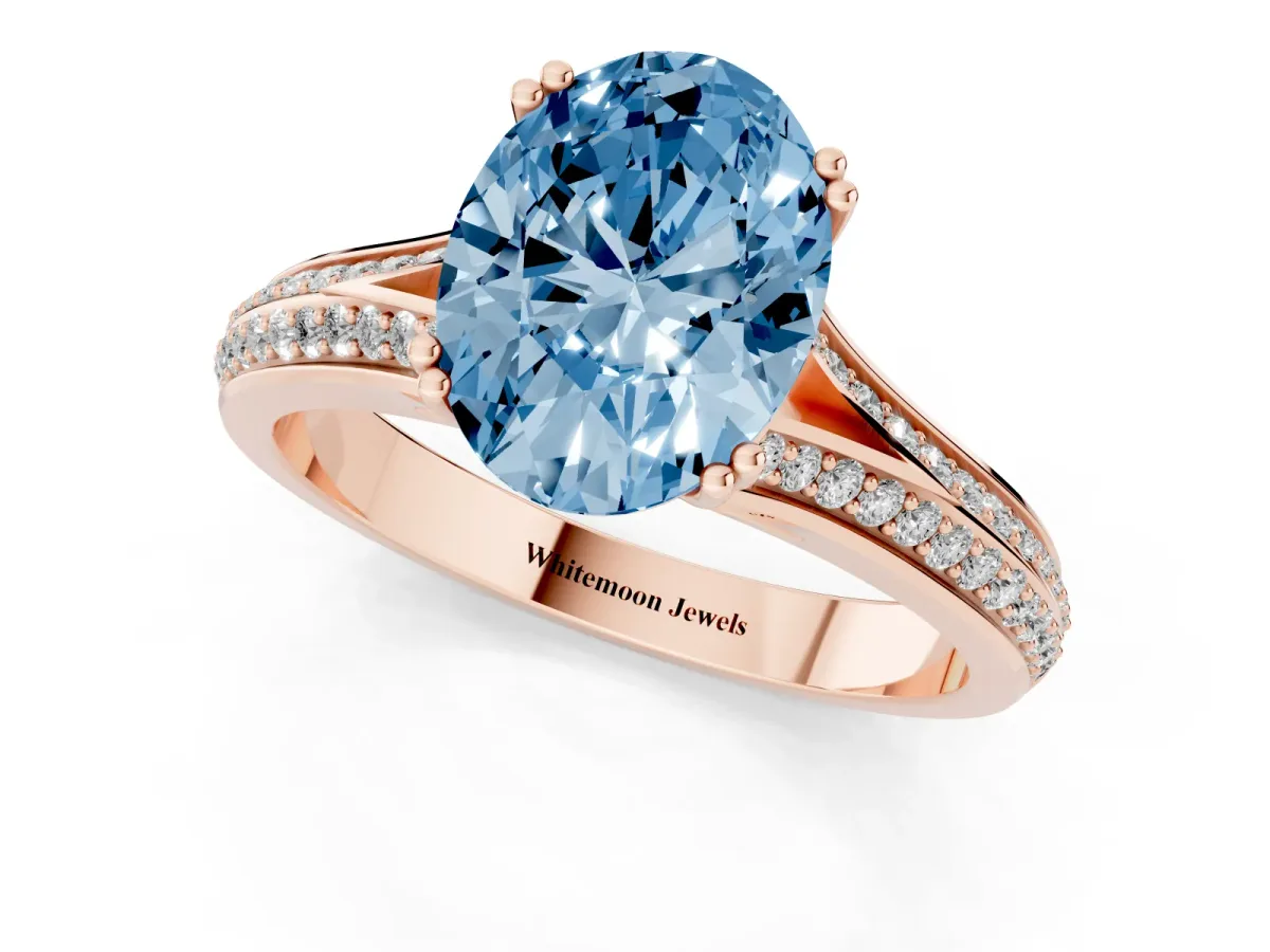 Fancy Blue Oval Cut Diamond Split Shank Engagement Ring with Pavé Band Rose gold