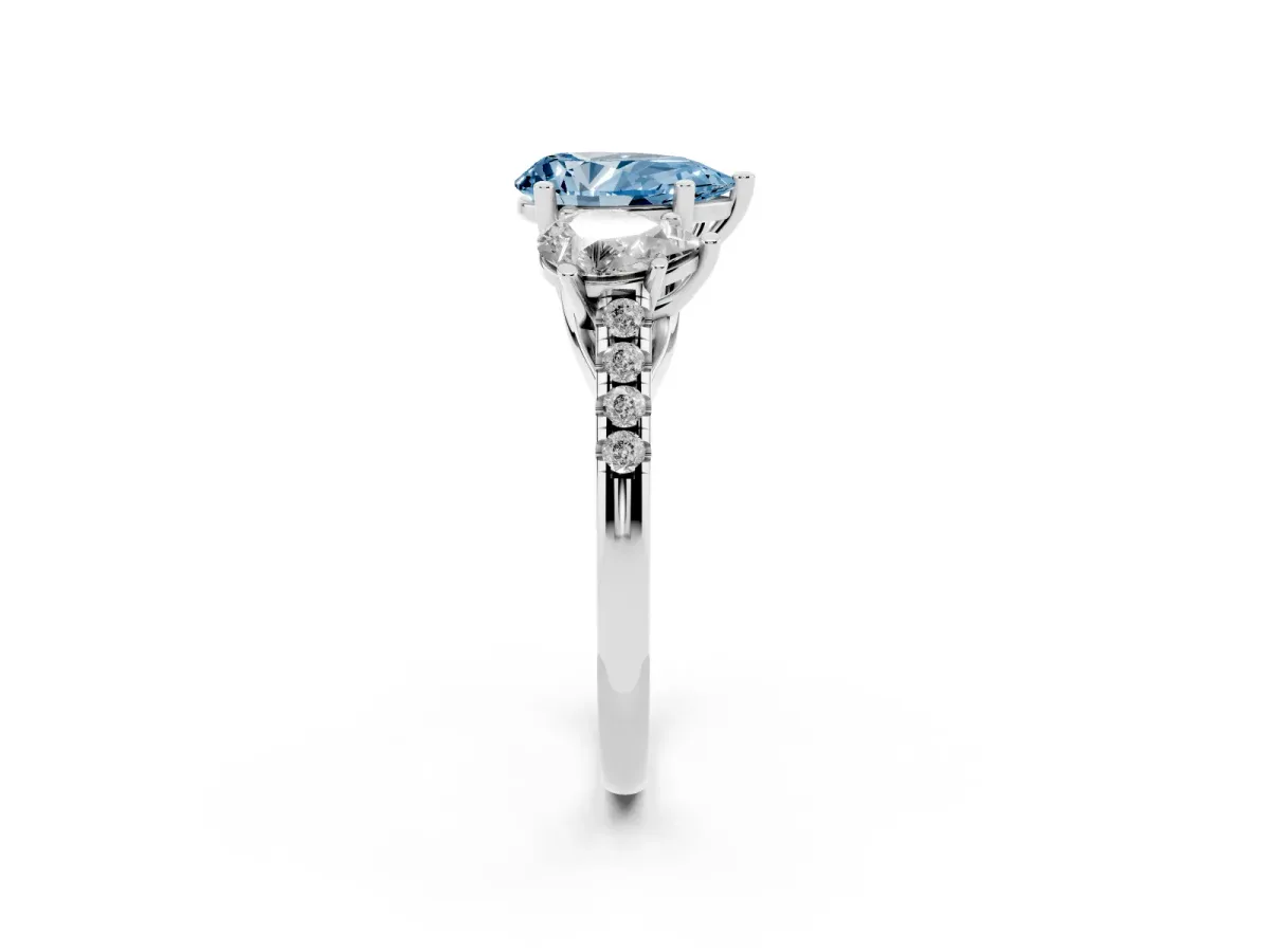 Fancy Blue Three-Stone Pear Cut Diamond Ring with Round Pavé Band and Prong Setting Silver