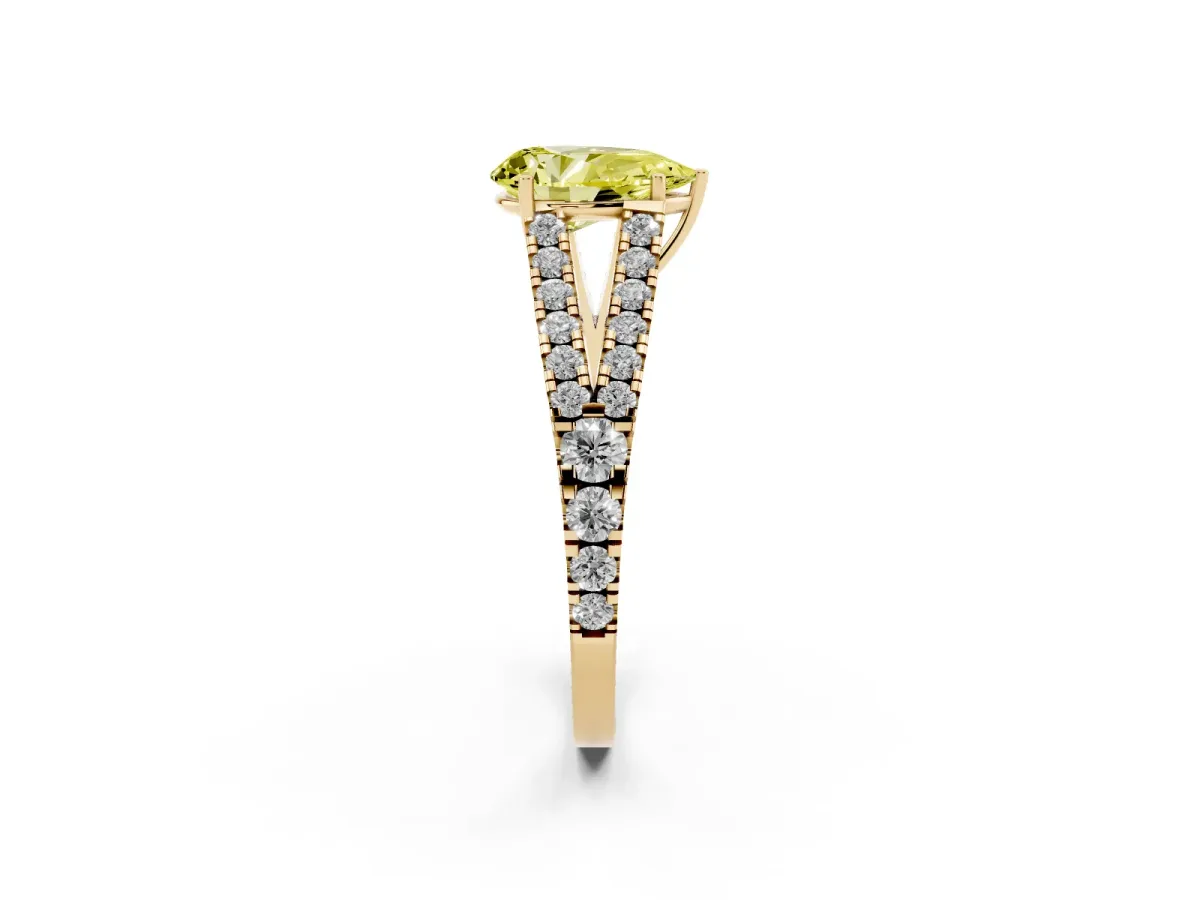 Fancy Yellow Pear Cut Diamond Split Shank Engagement Ring with Round Pavé and Prong Setting Yellow gold