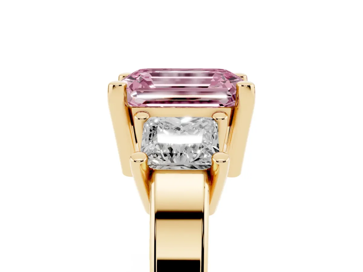 Fancy Pink Three-Stone Emerald Cut Cut Solitaire Ring with Prong Setting Yellow gold