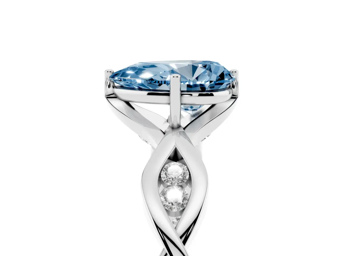 Fancy Blue Pear Cut Solitaire Twist Band with Leaf Prong Setting Silver
