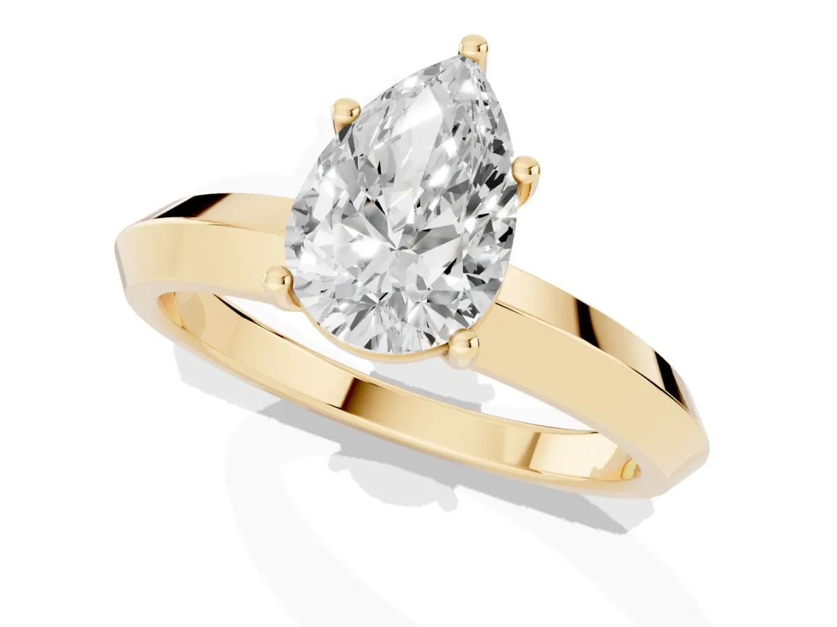 Pear Cut Cut Solitaire Engagement Ring with Flat Band and Four-Prong Setting Yellow gold