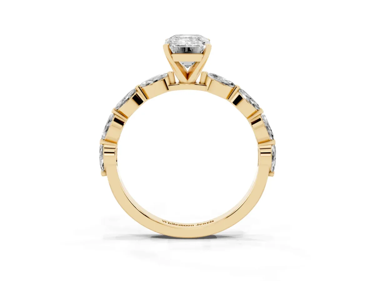 Emerald Cut Diamond Ring with Marquise Side Stones and Prong Setting Yellow gold