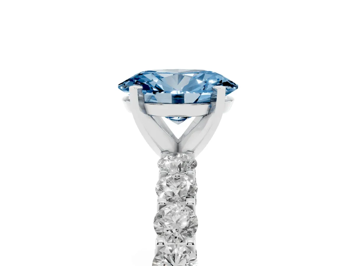 Fancy Blue Oval Cut Diamond Solitaire Ring with Shared Prong Pavé Band and Four-Prong Setting Silver