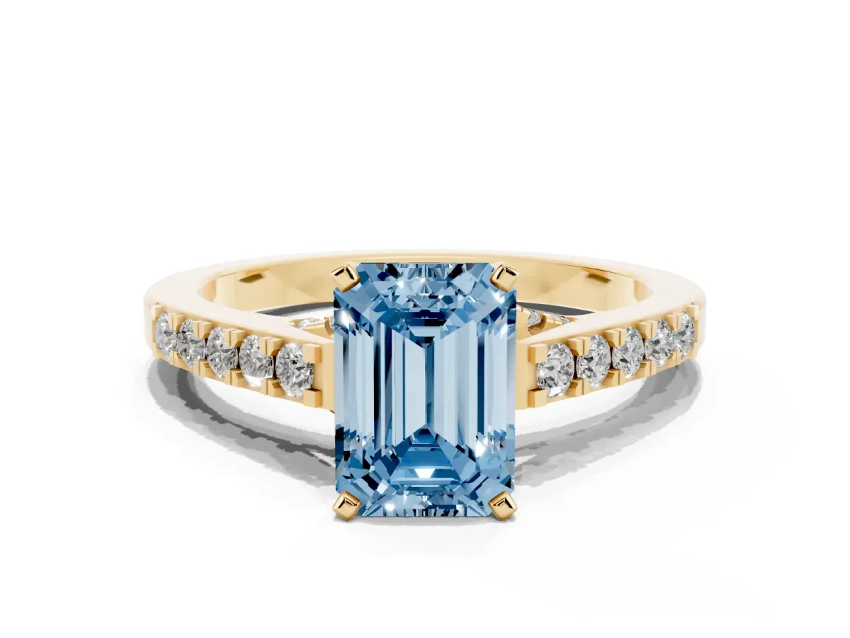 Fancy Blue Emerald Cut Diamond Solitaire Ring with Crossover Gallery and Round Pavé Band Yellow gold