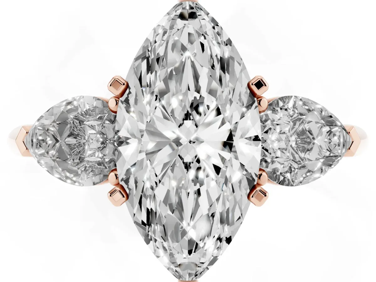 Three-Stone Marquise Cut Diamond Ring with Pear Side Stones and Four-Prong Setting Rose gold