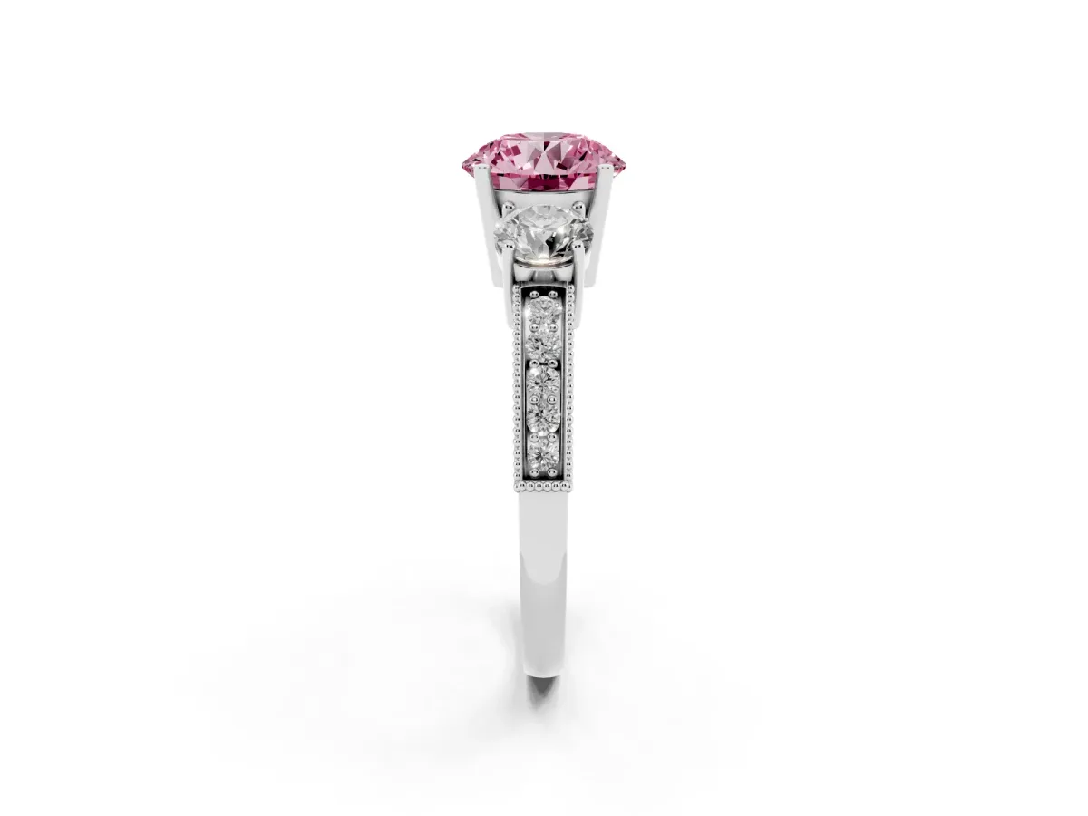 Fancy Pink Round Cut Three-Stone Diamond Ring with Pavé Band and Four-Prong Setting Silver