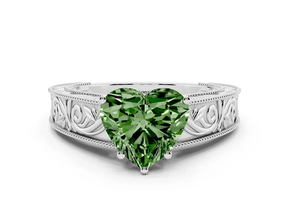 Fancy Green Heart Cut Diamond Solitaire Ring with Engraved Band and Four-Prong Setting Silver