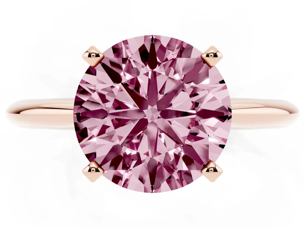 Fancy Pink Round Cut Cut Solitaire Ring with Four-Prong Setting on a Classic Band Rose gold