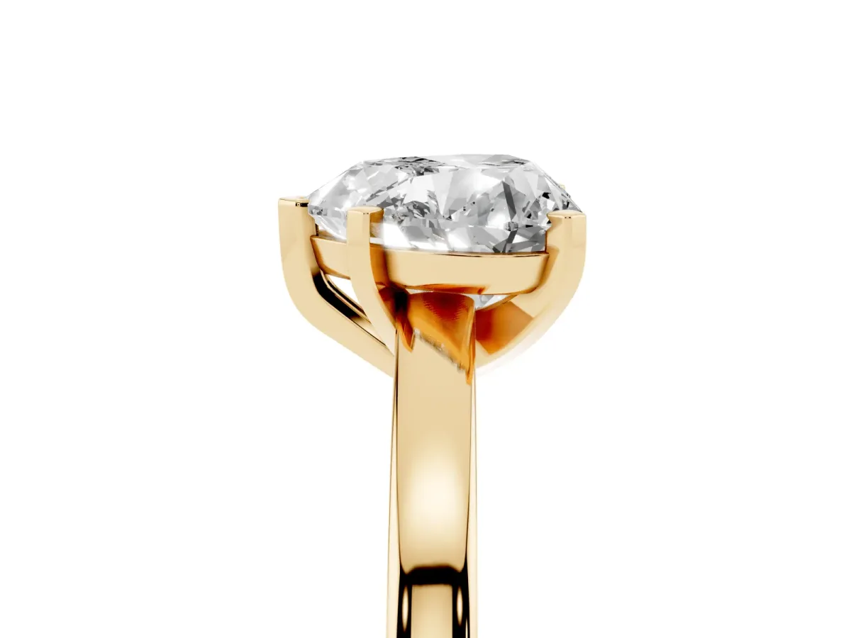 Heart Cut Solitaire Diamond Engagement Ring with Four-Prong Setting on a Classic Band Yellow gold