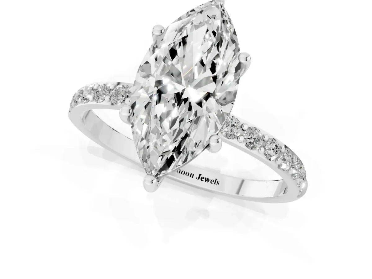 Marquise Cut Diamond Solitaire Ring with Round Pavé Shoulders and Prong Setting Silver