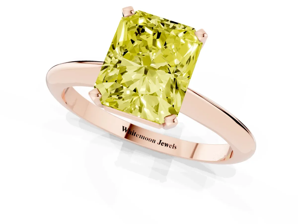 Fancy Yellow Radiant Cut Cut Solitaire Ring with Four-Prong Setting on a Classic Band Rose gold