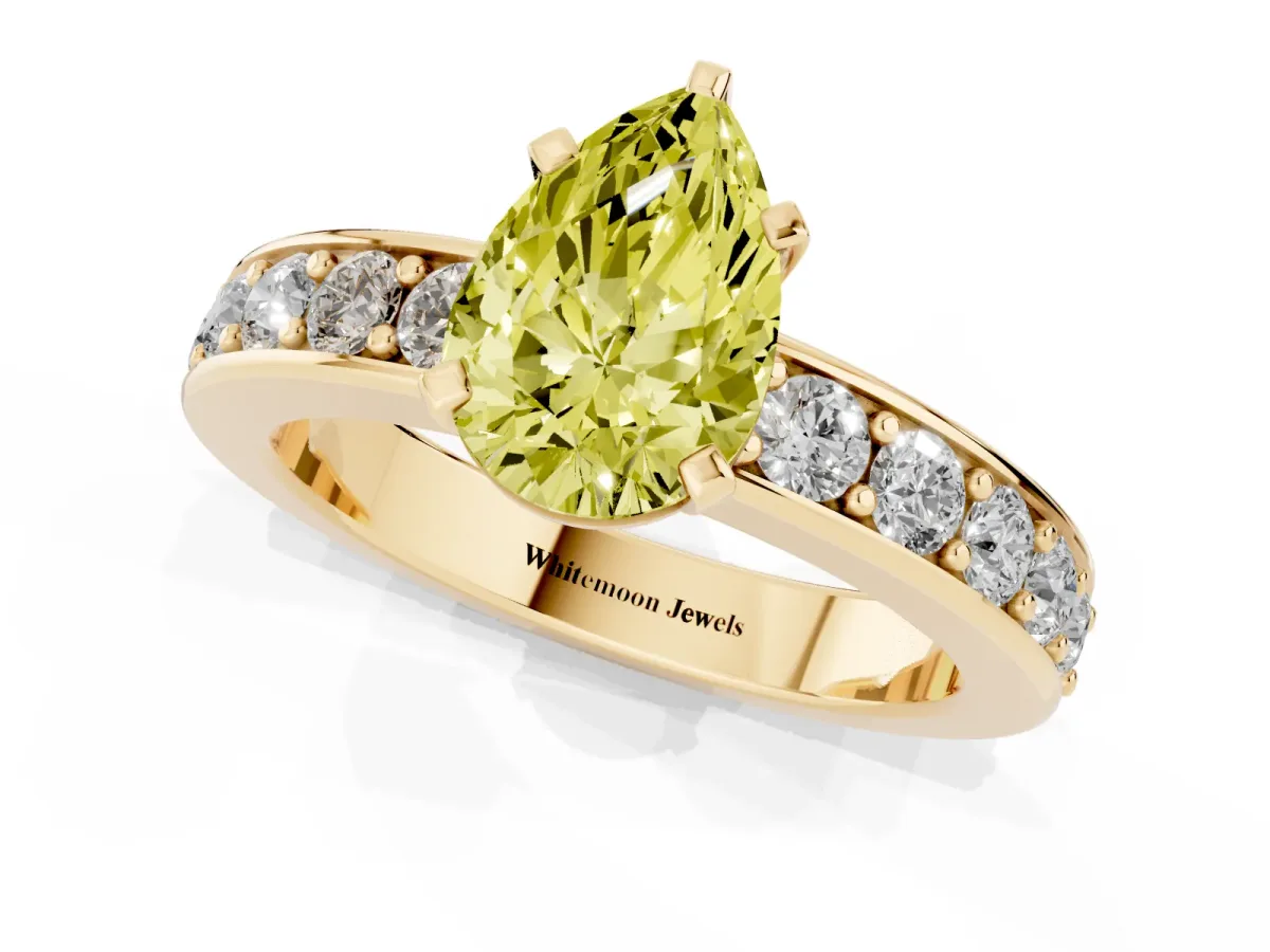 Fancy Yellow Pear Cut Diamond Engagement Ring with Channel Set Round Band and Prong Setting Yellow gold