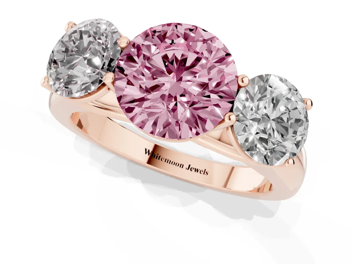 Fancy Pink Round Cut Three-Stone Diamond Ring with Prong Setting on a Classic Band Rose gold