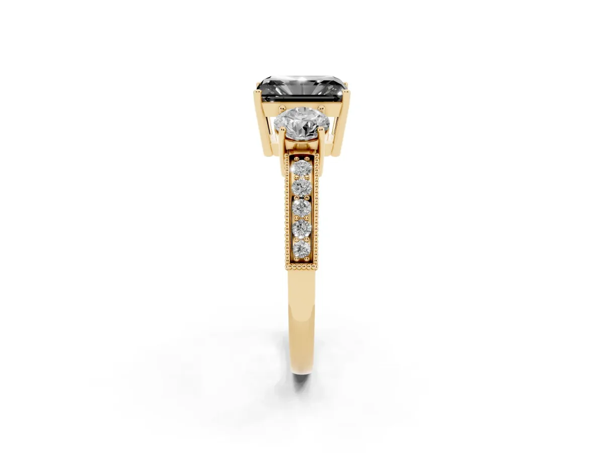 Fancy Black Radiant Cut Three-Stone Diamond Ring with Pavé Band and Four-Prong Setting Yellow gold