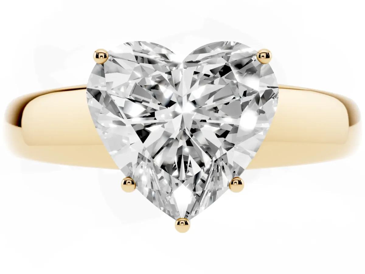 Heart Cut Solitaire Diamond Ring with Tapered Band and Four-Prong Setting Yellow gold