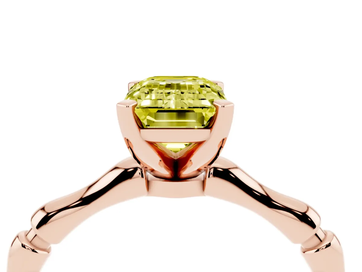 Fancy Yellow Emerald Cut Solitaire Diamond Ring with Bamboo Band and Four-Prong Setting Rose gold