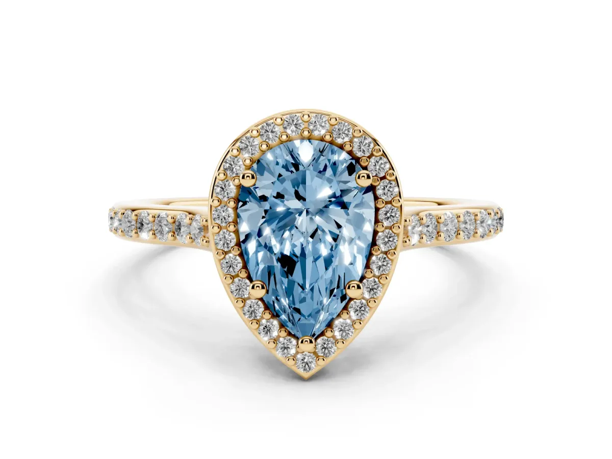 Fancy Blue Pear Cut Diamond Halo Engagement Ring with Round Pavé Shoulders and Prong Setting Yellow gold