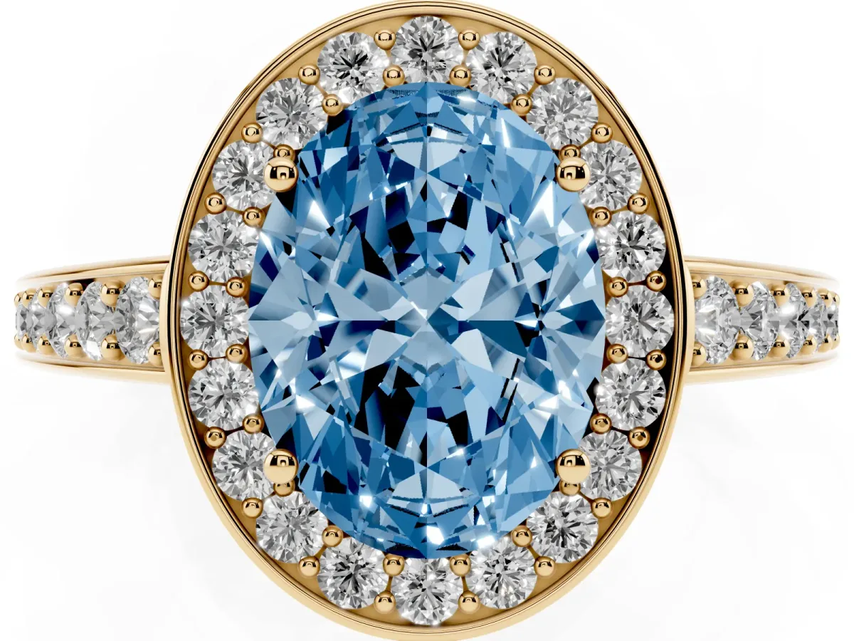 Fancy Blue Oval Cut Halo Pavé Diamond Engagement Ring with Bezel Setting Yellow gold
