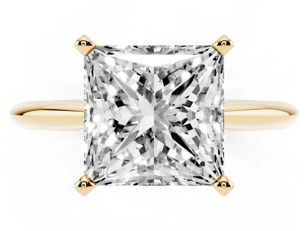 Princess Cut Cut Solitaire Ring with Four-Prong Setting on a Classic Band Yellow gold