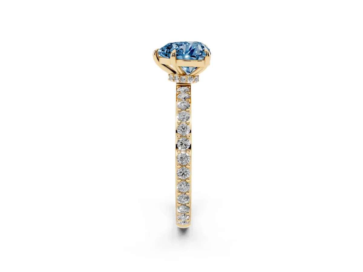 Fancy Blue Heart Cut Diamond Pavé Engagement Ring with Round Accents and Prong Setting Yellow gold