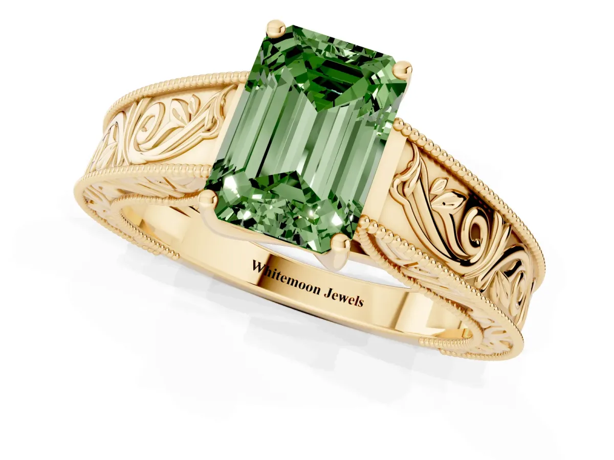 Fancy Green Emerald Cut Diamond Solitaire Ring with Engraved Band and Four-Prong Setting Yellow gold