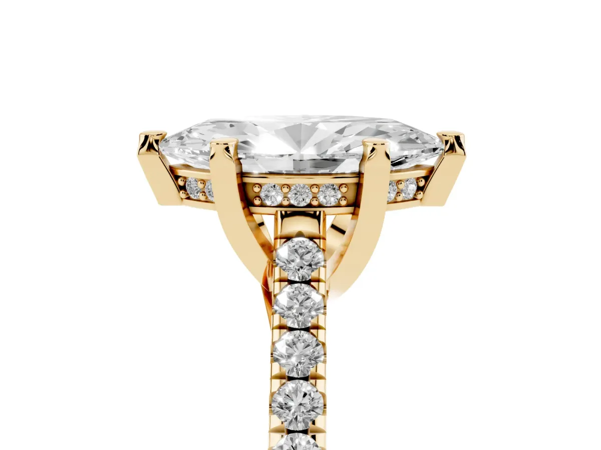 Marquise Cut Brilliant Diamond Solitaire with Pavé Band and Four-Prong Setting Yellow gold