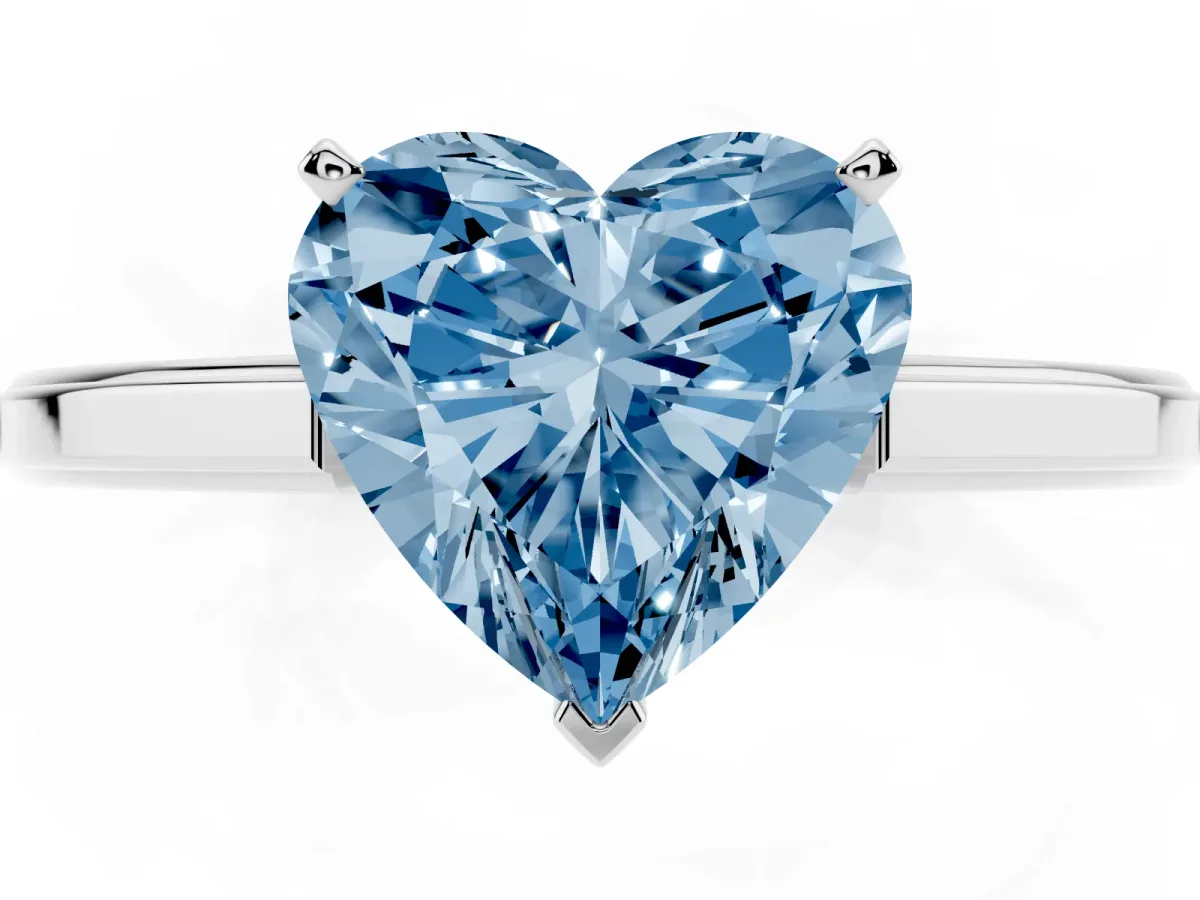 Fancy Blue Heart Cut Solitaire Diamond Ring with Four-Prong Setting and Classic Band Platinum